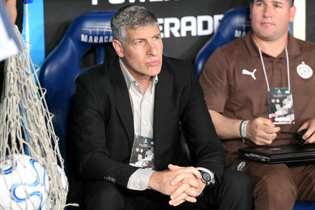 (FILES) Platense's head coach Martin Palermo looks on ahead of the Copa Libertadores quarter-final first leg football match between Brazil's Fluminense and Argentina's Platense at the Maracana stadium in Rio de Janeiro, Brazil on September 8, 2026. Martin Palermo, the iconic Argentine forward known for his dramatic comebacks and unforgettable feats in the Copa Libertadores, is now as head coach looking to infuse Platense with his cup aura to stage a comeback against Fluminense in Argentina on September 15, 2026, in order to advance to the semifinals. (Photo by MAURO PIMENTEL / AFP)