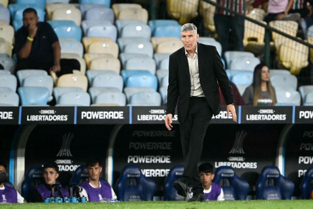 (FILES) Platense's head coach Martin Palermo looks on during the Copa Libertadores quarter-final first leg football match between Brazil's Fluminense and Argentina's Platense at the Maracana stadium in Rio de Janeiro, Brazil on September 8, 2026. Martin Palermo, the iconic Argentine forward known for his dramatic comebacks and unforgettable feats in the Copa Libertadores, is now as head coach looking to infuse Platense with his cup aura to stage a comeback against Fluminense in Argentina on September 15, 2026, in order to advance to the semifinals. (Photo by MAURO PIMENTEL / AFP)
