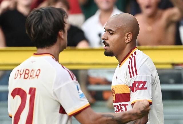 Roma's Dutch forward #14 Donyell Malen (R) celebrates with Roma's Argentine forward #21 Paulo Dybala (L) after scoring Roma's first goal during the Italian Serie A football match between Torino FC and Roma at the Olympic Stadium Grande Torino in Turin, northern Italy on September 14, 2026. (Photo by Isabella BONOTTO / AFP)