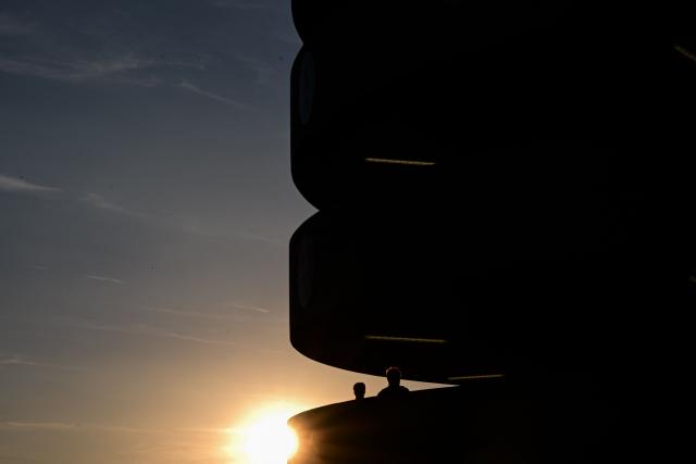 The sun sets behind the San Siro Stadium ahead of the Italian Serie A football match between Inter Milan and Udinese in Milan, Italy on September 14, 2026 (Photo by Piero CRUCIATTI / AFP)