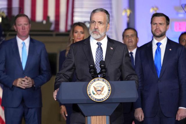 Inspector general of the Small Business Administration William W. Kirk speaks as Vice President JD Vance (R), and Senator Eric Schmitt (L), Republican from Missouri listen during an event about fraud enforcement at the FBI field office in Kansas City, Missouri, on September 14, 2026. (Photo by Mark Schiefelbein / POOL / AFP)