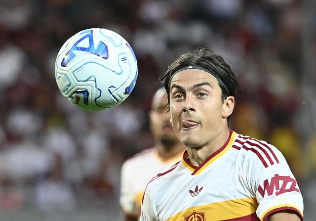 Roma's Argentine forward #21 Paulo Dybala eyes the ball during the Italian Serie A football match between Torino FC and Roma at the Olympic Stadium Grande Torino in Turin, northern Italy on September 14, 2026. (Photo by Isabella BONOTTO / AFP)