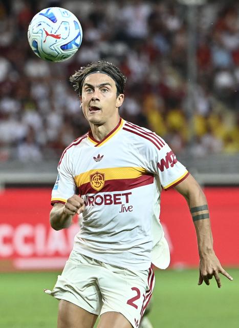 Roma's Argentine forward #21 Paulo Dybala watches the ball during the Italian Serie A football match between Torino FC and Roma at the Olympic Stadium Grande Torino in Turin, northern Italy on September 14, 2026. (Photo by Isabella BONOTTO / AFP)