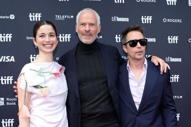 (L-R) Chilean actress Mariana di Girolamo, British-Irish director Martin McDonagh, US actor Sam Rockwell attend the premiere of "Wild Horse Nine" during the 2026 Toronto International Film Festival at Princess of Wales Theatre on September 14, 2026 in Toronto, Ontario. The 2026 Toronto International Film Festival (TIFF) runs September 10-20, 2026. (Photo by VALERIE MACON / AFP)