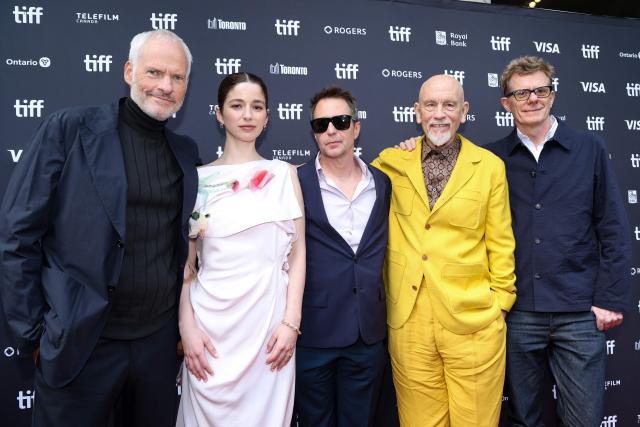 (L-R) Chilean actress Mariana di Girolamo, British-Irish director Martin McDonagh, US actor Sam Rockwell, US actor John Malkovich and British producer Graham Broadbent attend the premiere of "Wild Horse Nine" during the 2026 Toronto International Film Festival at Princess of Wales Theatre on September 14, 2026 in Toronto, Ontario. The 2026 Toronto International Film Festival (TIFF) runs September 10-20, 2026. (Photo by VALERIE MACON / AFP)
