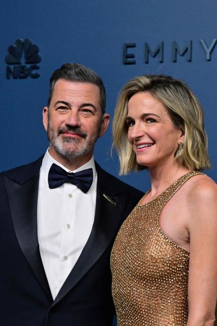 US television host Jimmy Kimmel and US producer Molly Mcnearney arrive for the 78th Primetime Emmy Awards at the Peacock Theatre at LA Live in Los Angeles on September 14, 2026. (Photo by Frederic J. Brown / AFP)