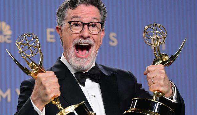 US comedian and writer Stephen Colbert winner of Outstanding Variety Series for "The Late Show with Stephen Colbert" and Outstanding Short Form Comedy, Drama or Variety Series for The Late Show digital/online program "Colbert Before Air" pose in the press room during the 78th Primetime Emmy Awards at the Peacock Theatre at LA Live in Los Angeles on September 14, 2026. (Photo by Frederic J. Brown / AFP)