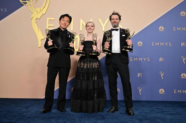 (From L) Japanese-US filmmaker Hiro Murai winner of the award for Outstanding Directing for a Comedy Seriesfor "Welcome to Widow's Bay" episode from "Widow's Bay", US screenwriter Katie Dippold winner of Outstanding Writing for a Comedy Series for "Widow's Bay" and Welsh actor Matthew Rhys winner of the awards for Outstanding Lead Actor in a Comedy Series for "Widow's Bay" and Outstanding Lead Actor in a Limited or Anthology Series or Movie for "The Beast in Me" pose in the press room during the 78th Primetime Emmy Awards at the Peacock Theatre at LA Live in Los Angeles on September 14, 2026. (Photo by Frederic J. Brown / AFP)