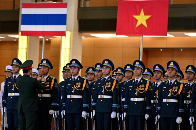 Vietnamese honour guards prepare ahead of a welcome ceremony for Thailand's King Maha Vajiralongkorn and Queen Suthida at the National Assembly House in Hanoi September 15, 2026. (Photo by Nhac NGUYEN / AFP)