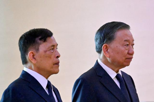 Vietnam's President To Lam (R) and Thailand's King Maha Vajiralongkorn attend a welcome ceremony at the National Assembly House in Hanoi on September 15, 2026. (Photo by Nhac NGUYEN / AFP)