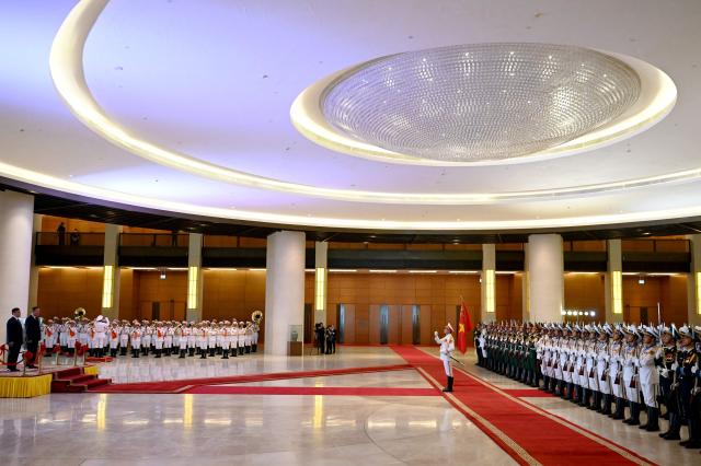 Vietnam's President To Lam (L) and Thailand's King Maha Vajiralongkorn (2nd L) attend a welcome ceremony at the National Assembly House in Hanoi on September 15, 2026. (Photo by Nhac NGUYEN / AFP)
