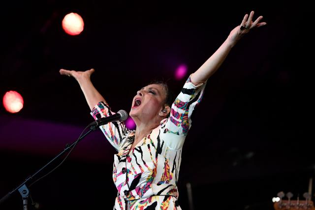 (FILES) French singer and musician Catherine Ringer performs on stage during an event marking the start of "Octobre Rose" (Pink October) or Breast Cancer Awareness Month, on October 1, 2019 in Paris. Catherine Ringer, lead singer of the legendary duo Les Rita Mitsouko, died of cancer at the age of 68, her children told AFP on September 15, 2026. (Photo by STEPHANE DE SAKUTIN / AFP)