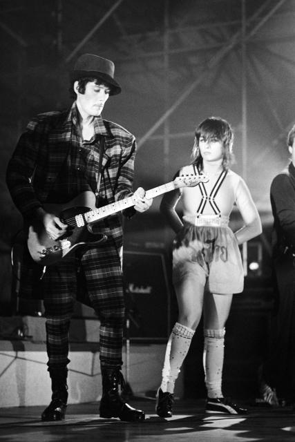 (FILES) French band Rita Mitsouko's Catherine Ringer and Fred Chichin perform on stage during the 10th edition of "Le Printemps de Bourges" rock and pop festival in the French city of Bourges on April 20, 1987. Catherine Ringer, lead singer of the legendary duo Les Rita Mitsouko, died of cancer at the age of 68, her children told AFP on September 15, 2026. (Photo by Frank PERRY / AFP)