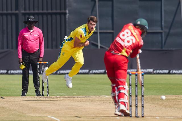 Australia's Xavier Bartlett delivers a ball during the first One Day International series played between hosts Zimbabwe and  Australia at Harare Sports Club on September 15, 2026 in Harare. (Photo by Jekesai NJIKIZANA / AFP)