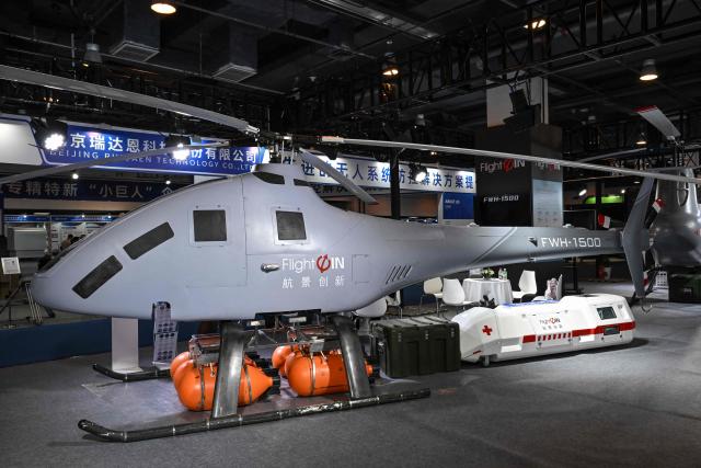 The FWH-1500 unmanned helicopter produced by Hangjing Chuangxin company is pictured during the 14th China International Defence Electronics Exhibition (CIDEX) in Beijing on September 15, 2026. (Photo by ADEK BERRY / AFP)