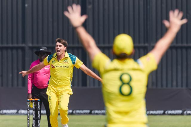 Australia's Xavier Bartlett (L) appeals for a wicket during the first One Day International series played between hosts Zimbabwe and  Australia at Harare Sports Club on September 15, 2026 in Harare. (Photo by Jekesai NJIKIZANA / AFP)