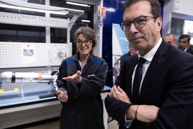 France's Labour Minister Jean-Pierre Farandou (R) visits the training and learninc center of the MBDA multinational group plant, a corporation that designs and manufactures missiles and weapons in Selles-Saint-Denis on September 15, 2026. On September 15, 2026, the European missile manufacturer MBDA confirmed to AFP its plan to set up a new production site near Orléans, intended to support the sharp ramp-up in its missile production and which could eventually employ 400 people. (Photo by Alain JOCARD / AFP)