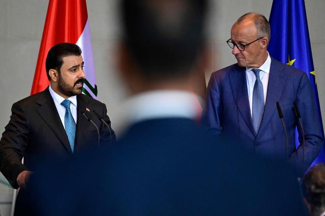 German Chancellor Friedrich Merz (R) and Iraq's Prime Minister Ali Falih Kadhim al-Zaidi deliver a joint press conference on September 15, 2026 at the Chancellery in Berlin. (Photo by John MACDOUGALL / AFP)