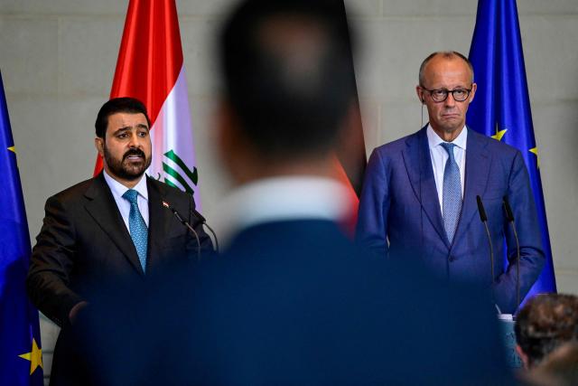 German Chancellor Friedrich Merz (R) and Iraq's Prime Minister Ali Falih Kadhim al-Zaidi deliver a joint press conference on September 15, 2026 at the Chancellery in Berlin. (Photo by John MACDOUGALL / AFP)