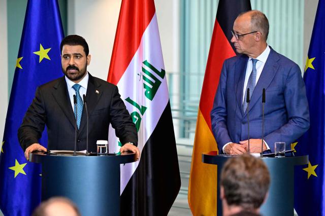 German Chancellor Friedrich Merz (R) and Iraq's Prime Minister Ali Falih Kadhim al-Zaidi deliver a joint press conference on September 15, 2026 at the Chancellery in Berlin. (Photo by John MACDOUGALL / AFP)