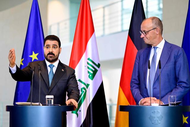 German Chancellor Friedrich Merz (R) and Iraq's Prime Minister Ali Falih Kadhim al-Zaidi deliver a joint press conference on September 15, 2026 at the Chancellery in Berlin. (Photo by John MACDOUGALL / AFP)