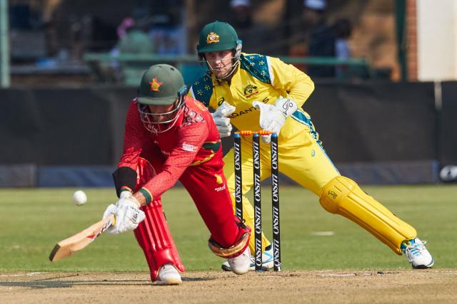 Zimbabwe's Craig Ervine plays a shot as Zimbabwe's wicket keeper Josh Inglis looks on during the first One Day International series played between hosts Zimbabwe and  Australia at Harare Sports Club on September 15, 2026 in Harare. (Photo by Jekesai NJIKIZANA / AFP)