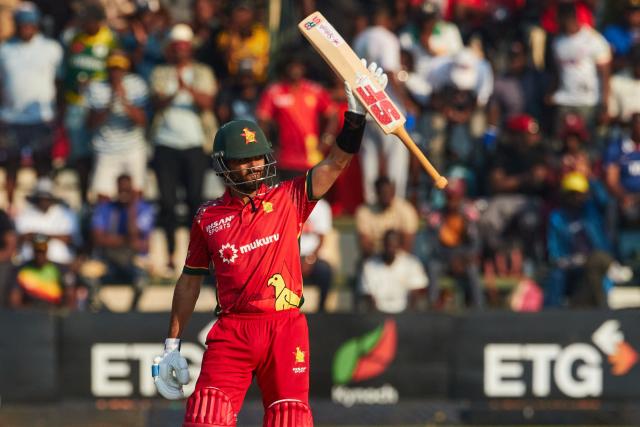 Zimbabwe's Sikandar Raza raises his bat on reaching 50 runs during the first One Day International series played between hosts Zimbabwe and  Australia at Harare Sports Club on September 15, 2026 in Harare. (Photo by Jekesai NJIKIZANA / AFP)