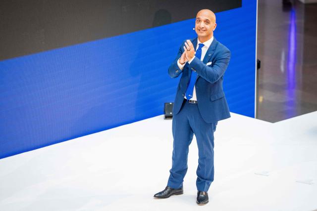 The CEO of Novo Mike Doustdar speaks during an employees' event in Bagsvaerd, Denmark, on September 15, 2026. Novo Nordisk introduces a new logo, new slogan, and a new employee philosophy. It's about keeping up with the times and addressing a new customer group more clearly. The company name Novo Nordisk has been reduced to Novo. The logo with the Apis bull - borrowed from Egyptian mythology - has been reversed, so the bull now looks to the right instead of the left. And the company's slogan will henceforth be "Lasting health starts now". (Photo by Mads Claus Rasmussen / Ritzau Scanpix / AFP) / Denmark OUT