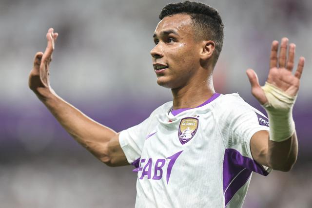 Ain's Moroccan forward #13 Houssine Rahimi celebrates after scoring his team's first goal during the AFC Champions League Elite (ACL) football match between Al-Ain and Al-Nassr at the Azza Bin Zayed stadium in Al-Ain on September 15, 2026. (Photo by Fadel SENNA / AFP)