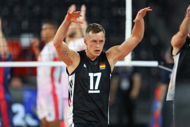 Germany's Jan Zimmermann warms up prior to the EuroVolley 2026 volleyball Pool D match France vs Germany in Cluj Napoca, Romania, September 15, 2026. (Photo by Simion Sebastian Tataru / AFP)