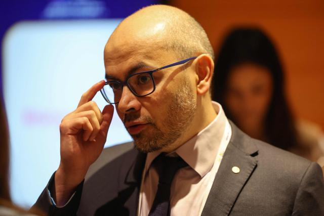 (FILES) DeepMind co-founder and chairman Demis Hassabis looks on during the AI Impact Summit in New Delhi on February 19, 2026. (Photo by Ludovic MARIN / AFP)