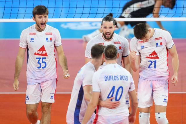France's players celebrate during the Men's EuroVolley 2026 match between France and Germany at the BT Arena in Cluj-Napoca, Romania, on September 15, 2026. (Photo by Simion Sebastian Tataru / AFP)