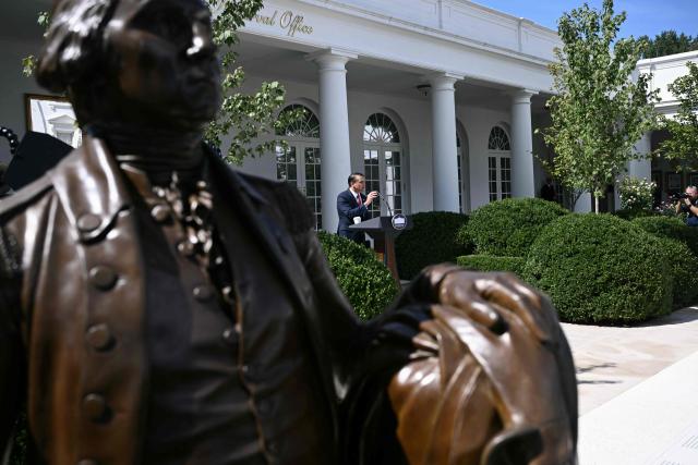 A statue of former US President George Washington is seen as US Attorney General Todd Blanche speaks during a briefing at the White House in Washington, DC, on September 15, 2026. (Photo by Brendan SMIALOWSKI / AFP)