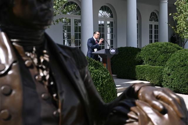 A statue of former US President George Washington is seen as US Attorney General Todd Blanche speaks during a briefing at the White House in Washington, DC, on September 15, 2026. (Photo by Brendan SMIALOWSKI / AFP)