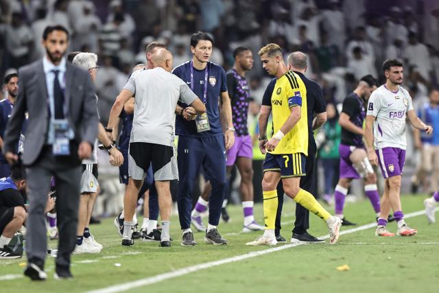 Nassr's Portuguese forward #07 Cristiano Ronaldo leaves the pitch at the end of the AFC Champions League Elite (ACL) football match between Al-Ain and Al-Nassr at the Azza Bin Zayed stadium in Al-Ain on September 15, 2026. (Photo by Fadel SENNA / AFP)