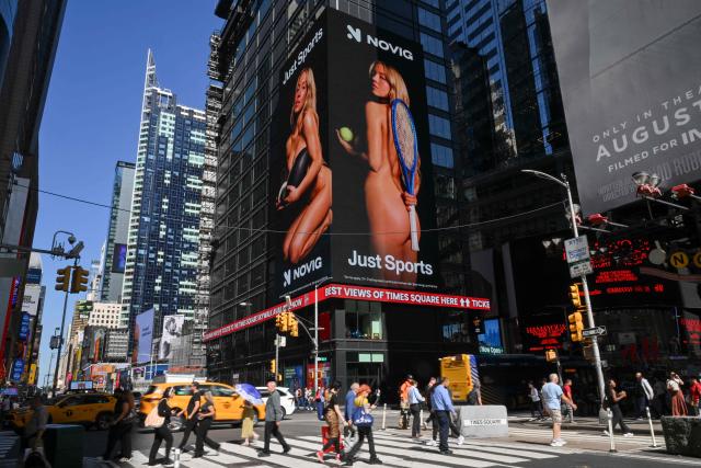US actress Sydney Sweeney appears in an advertising campaign for sports betting app Novig on a billboard in Times Square in New York City on September 15, 2026. Actor Sydney Sweeney has been condemned by leading women athletes for a sports betting advert in which the American appears in various states of undress. (Photo by ANGELA WEISS / AFP)