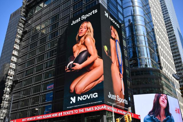 US actress Sydney Sweeney appears in an advertising campaign for sports betting app Novig on a billboard in Times Square in New York City on September 15, 2026. Actor Sydney Sweeney has been condemned by leading women athletes for a sports betting advert in which the American appears in various states of undress. (Photo by ANGELA WEISS / AFP)