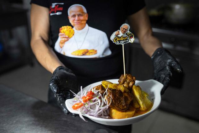 Ruth Garcia displays a Chiclayo-style dish called "Frito Chiclayano," said to have been one of Pope Leo XIV's favorite dishes, at her restaurant in Lima on September 15, 2026. Pope Leo XIV will visit Uruguay, Argentina and Peru from November 6 to 17, the Vatican said on August 5, in a return to the continent where the pontiff spent decades as a missionary. (Photo by Ernesto BENAVIDES / AFP)