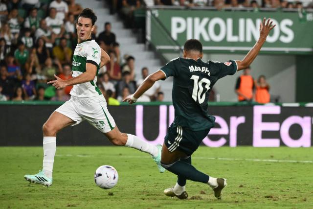 Real Madrid's French forward #10 Kylian Mbappe scores his team's second goal during the Spanish league football match between Elche CF and Real Madrid CF at Martinez Valero Stadium in Elche on September 15, 2026. (Photo by JOSE JORDAN / AFP)