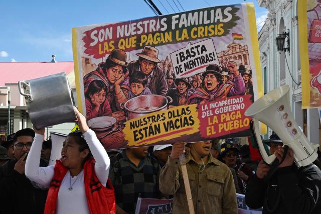 Education workers take part in a protest banging pots against the Bolivian government in La Paz on September 15, 2026. (Photo by Aizar RALDES / AFP)