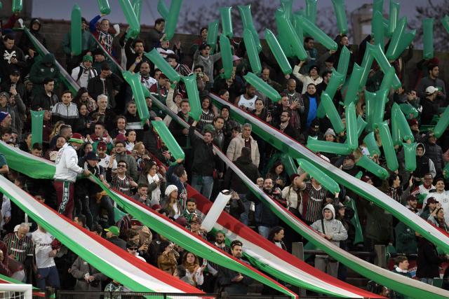 Fluminense fans cheer ahead of the Copa Libertadores quarter-final second leg football match between Argentina's Platense and Brazil's Fluminense at the Ciudad de Vicente Lopez stadium in Vicente Lopez, Buenos Aires province, Argentina on September 15, 2026. (Photo by JUAN MABROMATA / AFP)