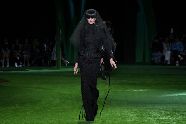 A model walks the runway during the 2027 Spring/Summer Thom Browne show as part of New York Fashion Week in New York on September 15, 2026. (Photo by ANGELA WEISS / AFP)