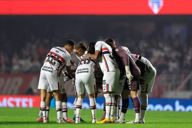 Sao Paulo players gather ahead of the Copa Sudamericana quarter-final second leg football match between Brazil's Sao Paulo and Argentina's Boca Juniors at the Morumbi stadium in Sao Paulo, Brazil on September 15, 2026. (Photo by Miguel SCHINCARIOL / AFP)
