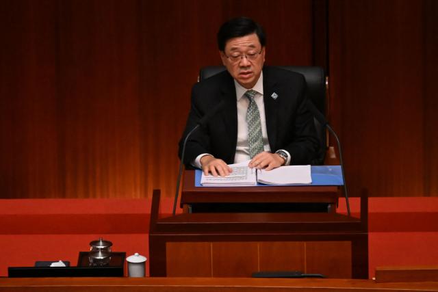 Hong Kong Chief Executive John Lee delivers Hong Kong's first five-year plan and his annual policy address at Central Government Offices chamber on September 16, 2026. (Photo by Peter PARKS / AFP)