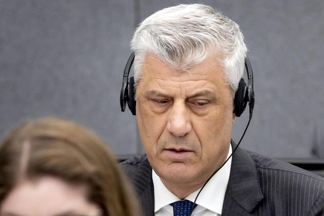 (FILES) Former Kosovo president Hashim Thaci sits in court as he appears on charges of war crimes before the Kosovo Tribunal in The Hague on April 3, 2023. Kosovo's former president Hashim Thaci was found guilty of war crimes and jailed for 25 years by a tribunal in the Hague on September 16, 2026, the court said in a long-awaited verdict likely to spark outrage in the Balkan country. The judges said Thaci, who was tried along with three other former guerrilla leaders, was guilty of illegal arrests, torture, murder and cruel treatment. Thaci is considered a hero by many in Kosovo, who have been eagerly awaiting the verdict after a three-year trial. (Photo by Koen van Weel / ANP / AFP) / Netherlands OUT