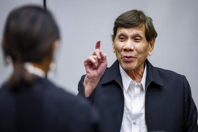 Former Philippine President Rodrigo Duterte appears at the International Criminal Court (ICC) in The Hague on September 16, 2026, during a preparatory session as he faces charges over his “war on drugs,” which killed thousands. Former Philippines president Rodrigo Duterte appeared in person at the International Criminal Court for the first time on September 16, 2026 as he faces charges over his "war on drugs" that killed thousands. The 81-year-old had appeared by video link when he was first brought to the court in The Hague, but had since skipped hearings, with his defence team saying he was too ill. (Photo by Piroschka VAN DE WOUW / ANP / AFP) / Netherlands OUT