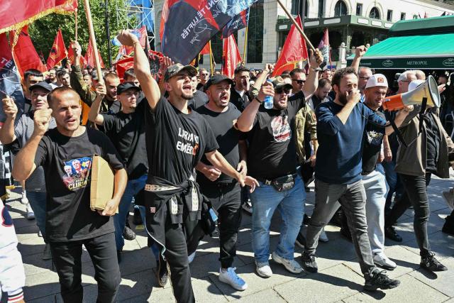Kosovo Albanians gather during a rally in Pristina on September 16, 2026 on the day of the war crimes verdict in the trial held in The Hague of former Kosovo President Hashim Thaci and three senior ex-guerrilla leaders. Kosovo's former president Hashim Thaci was sentenced to 25 years by a tribunal in The Hague on Wednesday for war crimes, the court said in a long-awaited verdict likely to spark outrage in the Balkan country. The judges said Thaci, who was tried along with three other former guerrilla leaders, was guilty of illegal arrests, torture, murder and cruel treatment committed by guerrilla fighters. (Photo by Elvis BARUKCIC / AFP)