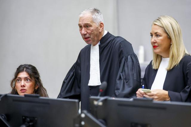 Defence counsel members Peter Haynes (C) and Kate Gibson (R) of former Philippine President Rodrigo Duterte attend the International Criminal Court (ICC) in The Hague on September 16, 2026, during a preparatory session as he faces charges over his “war on drugs,” which killed thousands. Former Philippines president Rodrigo Duterte appeared in person at the International Criminal Court for the first time on September 16, 2026 as he faces charges over his "war on drugs" that killed thousands. The 81-year-old had appeared by video link when he was first brought to the court in The Hague, but had since skipped hearings, with his defence team saying he was too ill. (Photo by Piroschka VAN DE WOUW / ANP / AFP) / Netherlands OUT