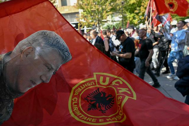 Kosovo Albanians gather during a rally in Pristina on September 16, 2026 on the day of the war crimes verdict in the trial held in The Hague of former Kosovo President Hashim Thaci and three senior ex-guerrilla leaders. Kosovo's former president Hashim Thaci was sentenced to 25 years by a tribunal in The Hague on Wednesday for war crimes, the court said in a long-awaited verdict likely to spark outrage in the Balkan country. The judges said Thaci, who was tried along with three other former guerrilla leaders, was guilty of illegal arrests, torture, murder and cruel treatment committed by guerrilla fighters. (Photo by Elvis BARUKCIC / AFP)
