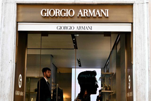 (FILES) A picture shows the Giorgio Armani logo on the front store at via dei Condotti in central Rome, on November 11, 2024. The Armani fashion house, whose founder and owner Giorgio Armani died last year, named Dario Vitale as the new creative director of its Emporio Armani line on September 16, 2026. (Photo by Alberto PIZZOLI / AFP)
